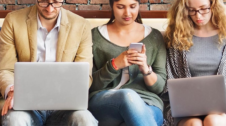 People looking at smart devices