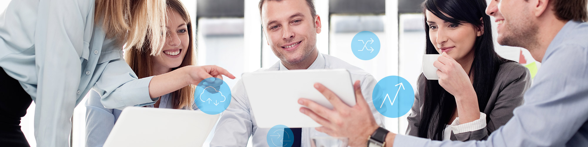 Coworkers looking at a tablet